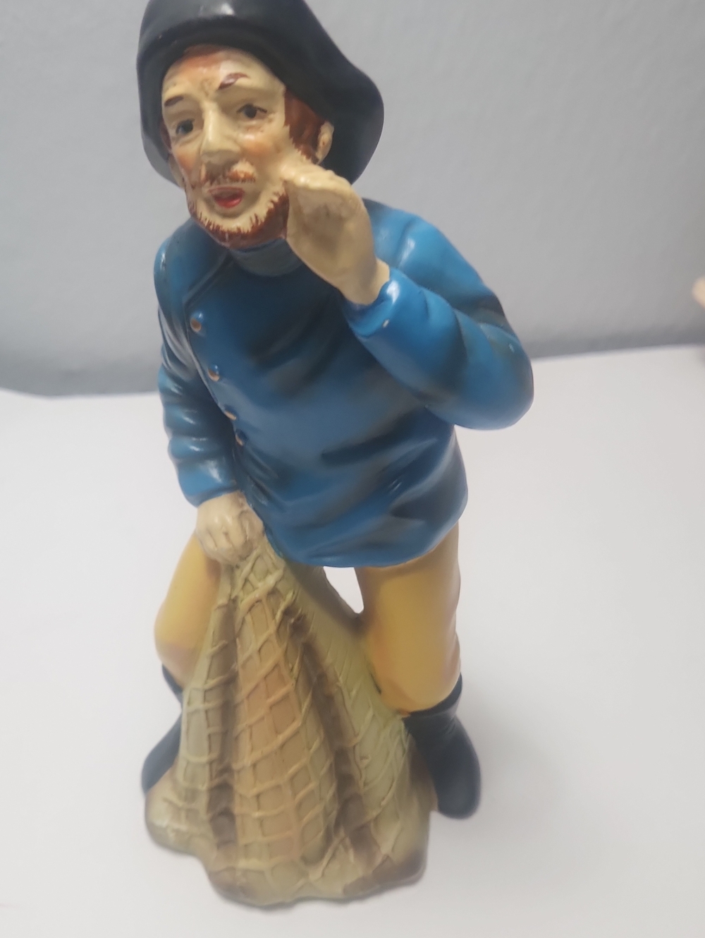 Blue-Clad Fisherman Figurine Home Art Statue Hand Painted Paul Herman Imports